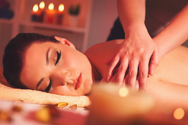 istock Beautiful young woman enjoying a massage 535164337