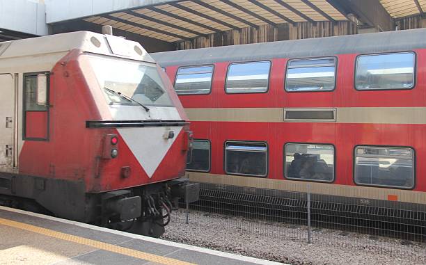 istock train arriving to the station 535164829