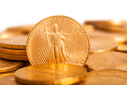 American Gold coins photographed with a short depth of field.