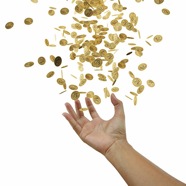 istock Coins falling down to the business's hand 535168087