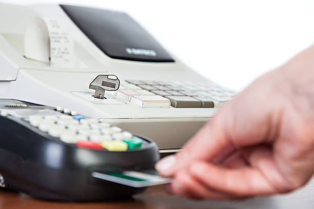 istock Close-up of cards servicing with POS-terminal 535168149