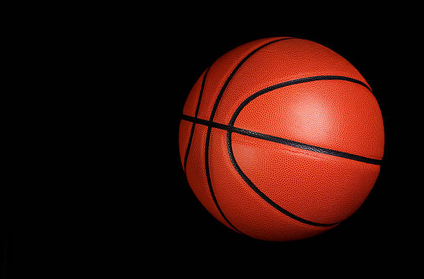 istock Basketball ball over black 535170037