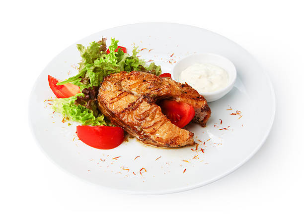 istock Restaurant food isolated - pikeperch fish steak 535171441