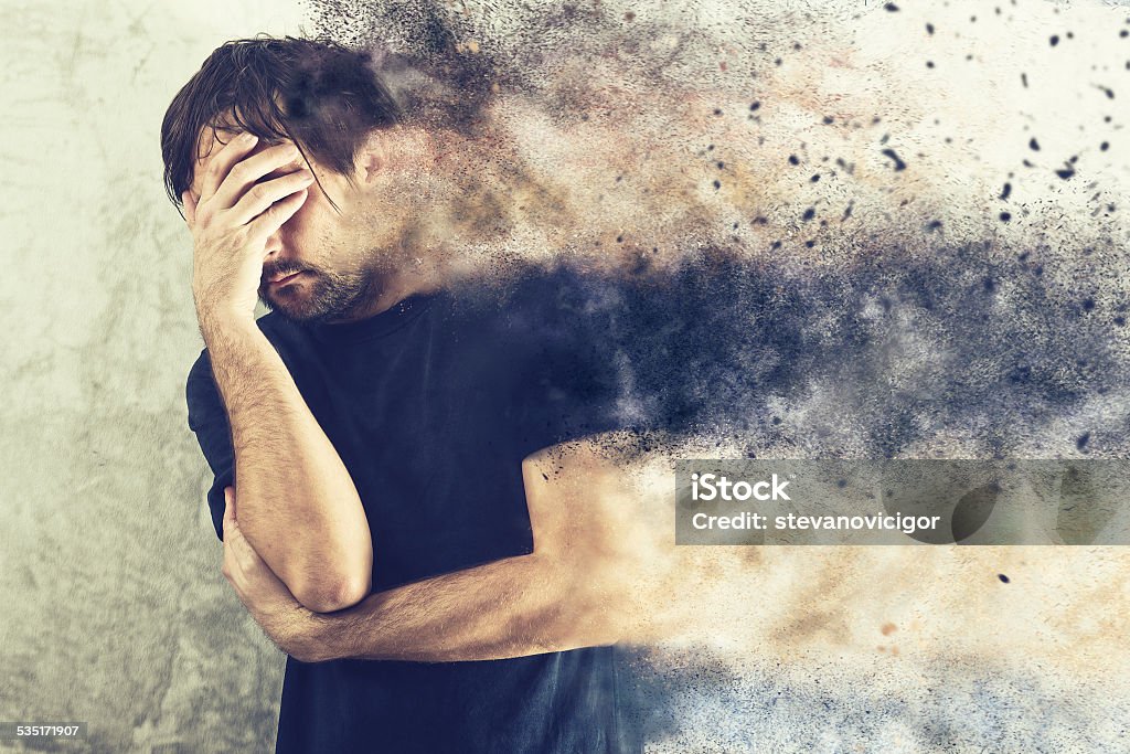 Depressed Man Portrait Depressed Man with Problems holding hand over his Face and Crying, occupied by Mind Blowing Thoughts Contemplation Stock Photo