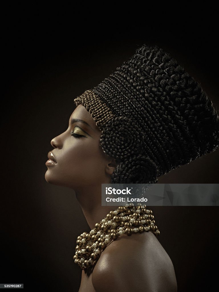 Nefertiti Black woman wearing Nefertiti crown made from hair Women Stock Photo