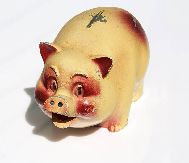 Gold Colored Piggy Bank - White Background - 3D Rendering