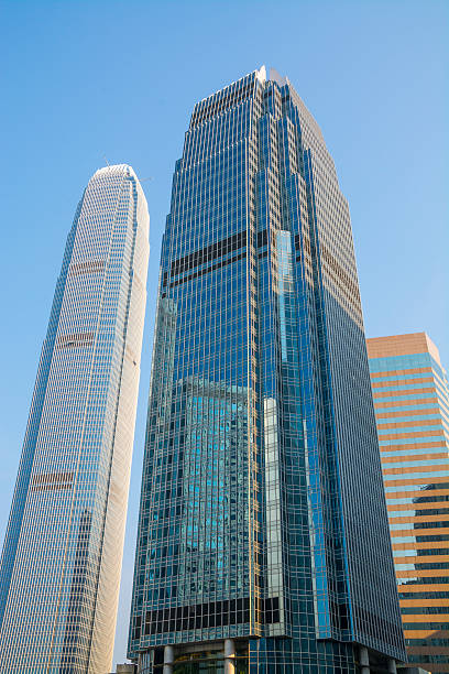 istock Reflectiv skyscrapers from low angle view with clear blue sky 535192365