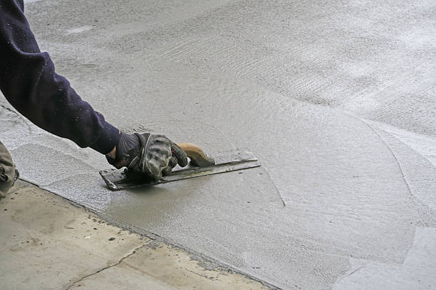 istock Make a concrete driveway- fresh cement and finishing trowel 535193690