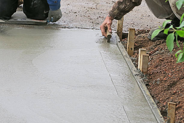 istock Make a concrete driveway- fresh cement and finishing trowel 535193864