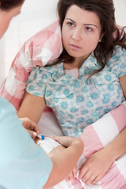 istock Ill woman and nurse 535194183