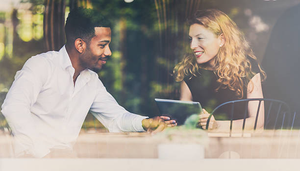 istock Business people discussing in a cafe 535194298