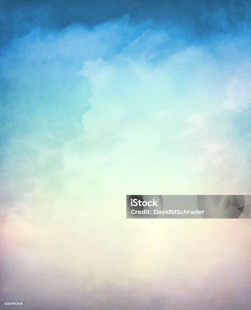 Textured Gradient Cloudscape An abstraction of clouds and fog on a textured background with a multi-colored gradient.  Image displays a distinct paper grain and texture at 100 percent. Backgrounds Stock Photo