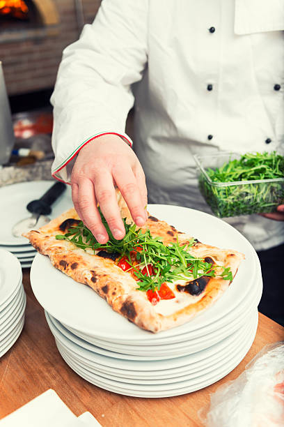 istock Fresh pizza with rucola topping 535195195