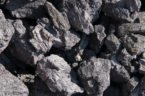 Heap of heating coke, close-up Heap of heating coke, close-up coke coal stock pictures, royalty-free photos & images