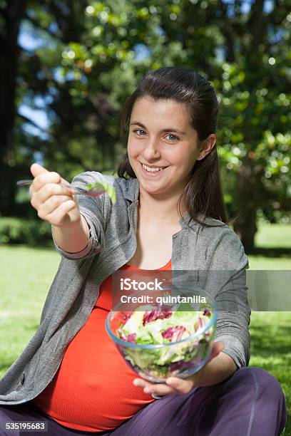 Young Pregnant Offering Salad Stock Photo - Download Image Now - 2015, Adult, Adults Only