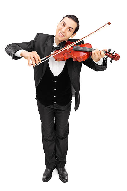 istock Cheerful violinist playing a violin 535196831