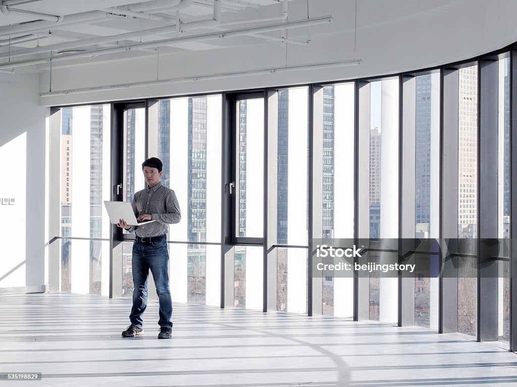 Asian businessman working in office 2015 Stock Photo