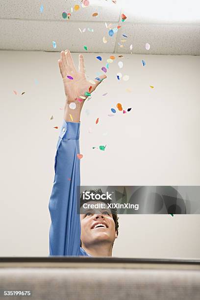 Businessman Throwing Confetti Stock Photo - Download Image Now - Business, Fun, 2015