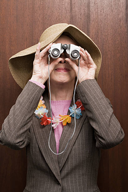 istock Business woman looking through binoculars 535200983