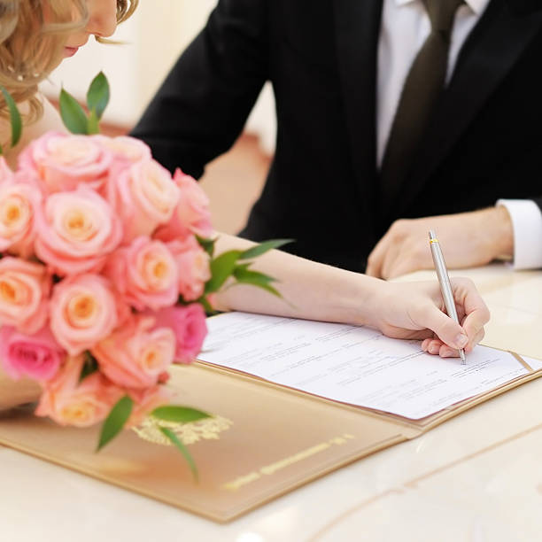 istock Bride signing marriage license 535201115
