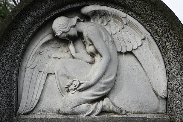 istock Mourning angel at the abandoned cemetery. 535202063