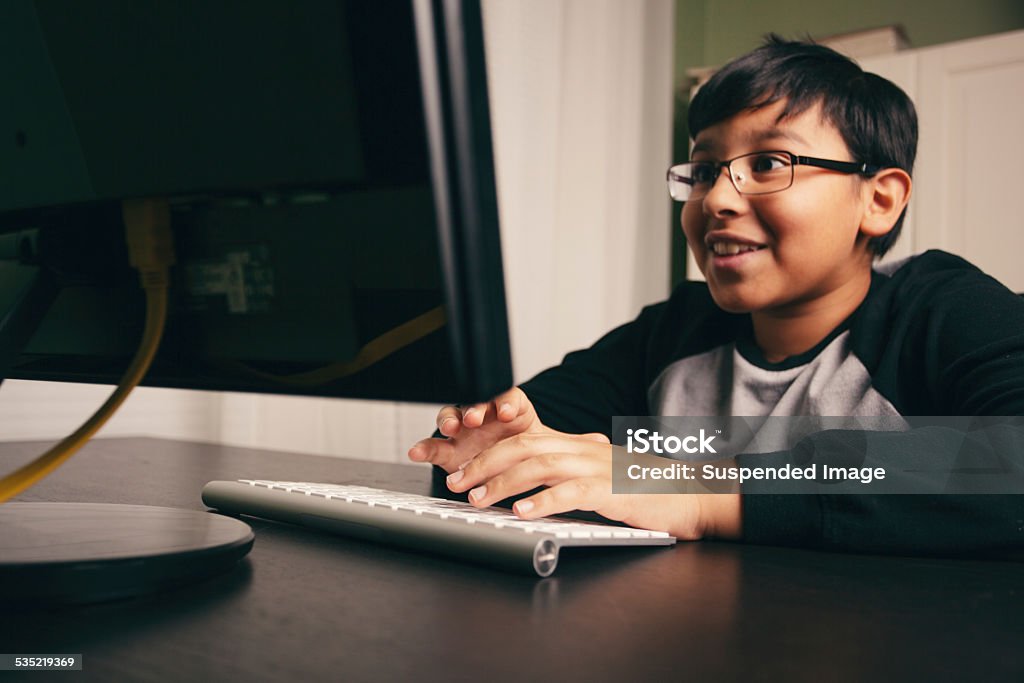 Excited Tween Using Computer Stock Photo - Download Image Now - 2015 ...