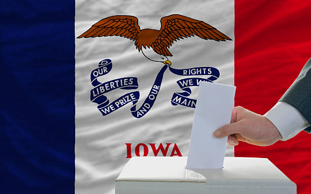 elections voting in front of flag of iowa stock photo