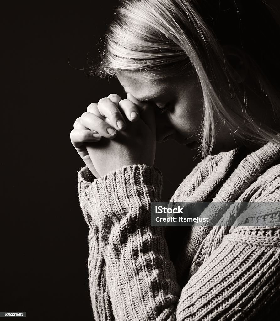 Praying woman. 2015 Stock Photo