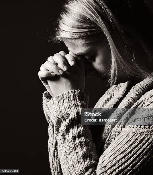 Praying Woman Stock Photo - Download Image Now - 2015, Adult, Adults Only