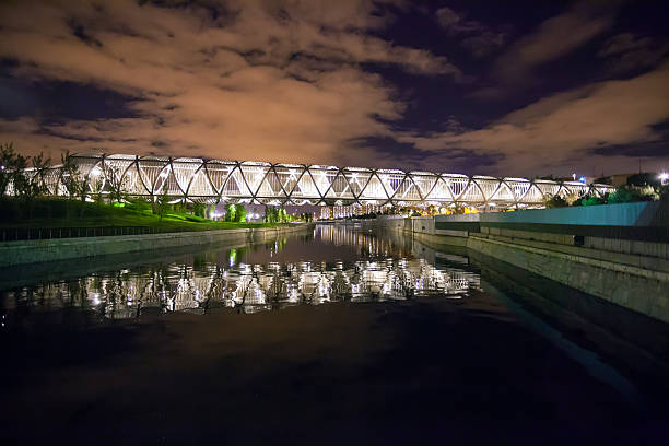 Madrid, Spain - May 8, 2012: Arganzuela Bridge illuminated at night and Madrid Rio Park, Madrid, Spain