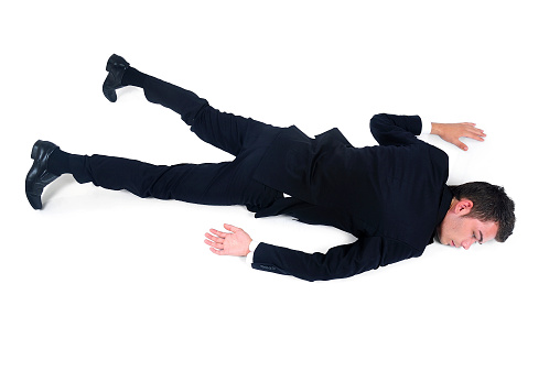 Isolated exhausted business man on white