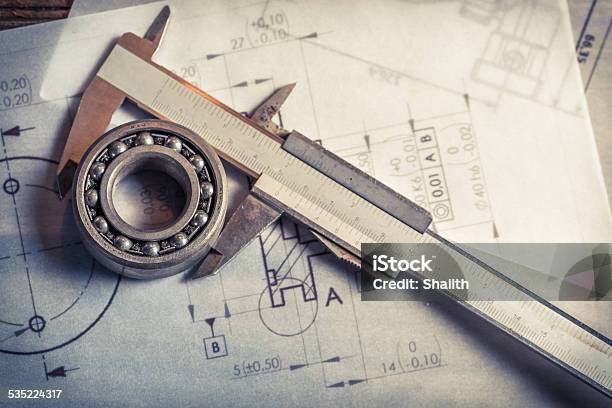 Foto de Tendo Mecânicas Compasso De Calibre E Diagramas e mais fotos de stock de Rolimã - Rolimã, Ideia, Micrômetro