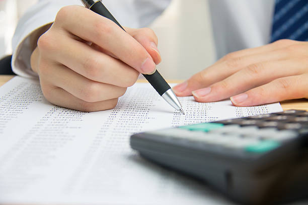 istock Businessman calculating the financial statements 535225017