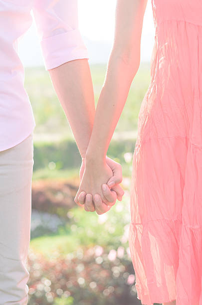 istock Young lovers couple holding hands 535225799