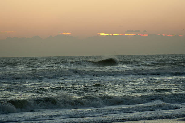Surf at Sunrise stock photo