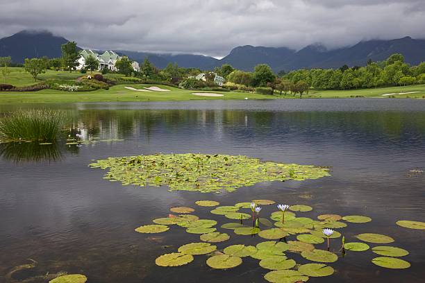 Water Hazard A forbidding water hazard on a beautiful hole of the Montagu course at the Fancourt Golf Course near George along The Garden Route in South Africa george south africa stock pictures, royalty-free photos & images
