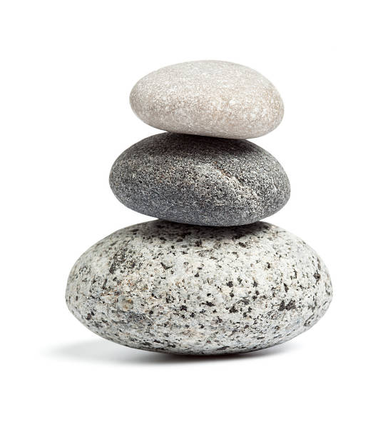 Zen stones balance concept Zen stones balance concept isolated on white cairn stock pictures, royalty-free photos & images
