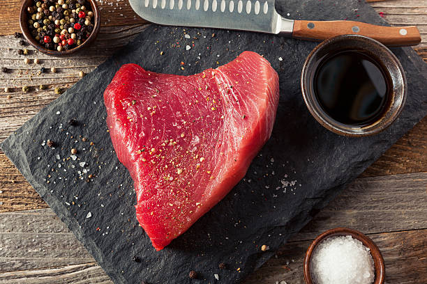 raw organic pink tuna steak - tuna tuna steak raw freshness imagens e fotografias de stock