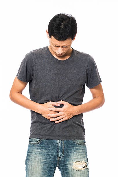 istock Man suffering from stomach pain 535239109