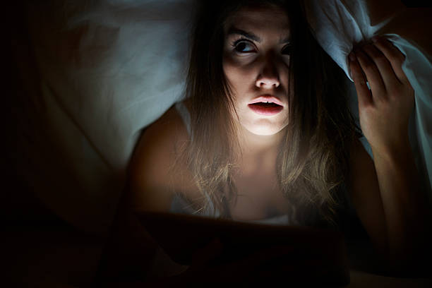 istock She watching scary movie being alone at home 535240905