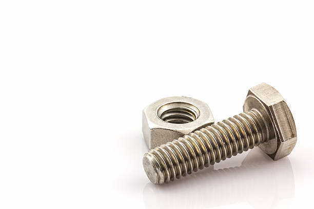 istock Metal screw and nuts on white background. 535240973