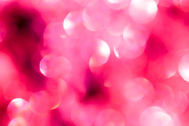 istock Pink sequins in bokeh - background and festive atmosphere 535242051