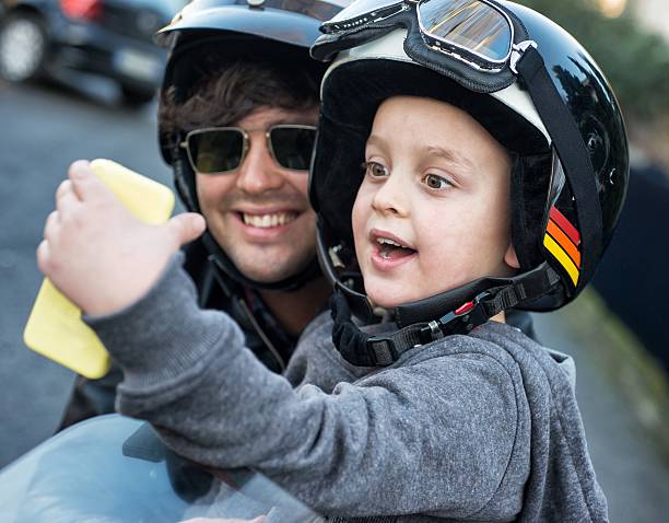 istock Bikers Father and Son Doing a Selfie 535244057