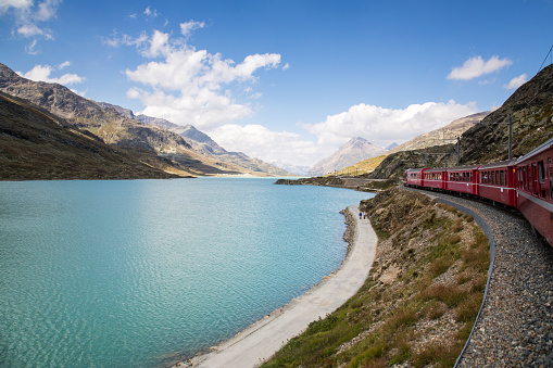 Panoramic view over the Alps from the red train Bernina Express from Tirano (Italy) to St. Moritz (Switzerland)