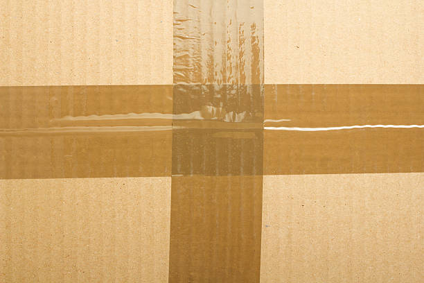istock texture of cardboard and adhesive tape for background 535261499