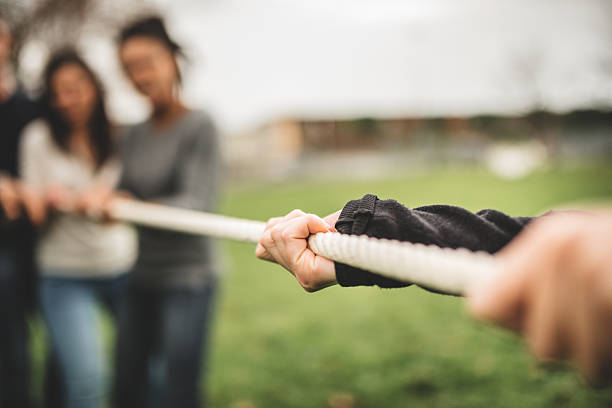 istock Friends doing the Tug of war - teamwork 535261843