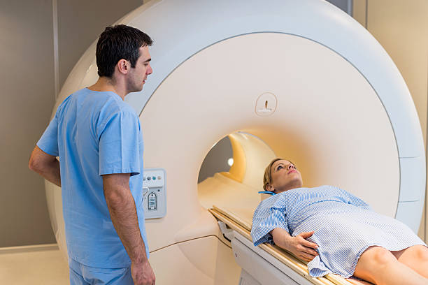 istock Female patient about receive an MRI Scan. 535264233