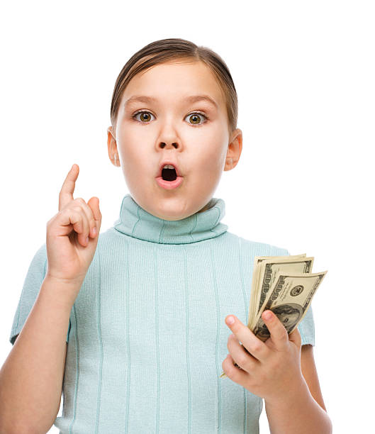 istock Cute girl with dollars 535264495