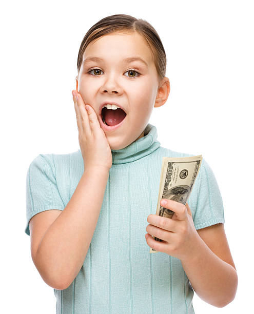 istock Cute girl with dollars 535264499