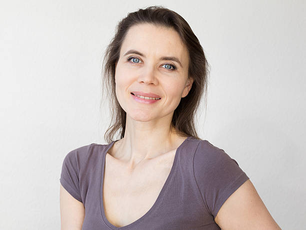 istock Woman with attractive smile looking into camera 535264567